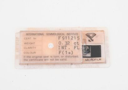 Diamant taille brillant sous scellé IGI.

0,32...