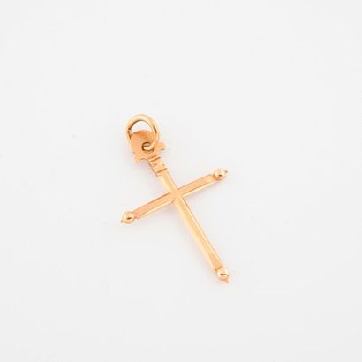 Yellow gold cross (750), the ends decorated...