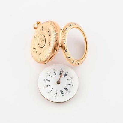 Gusset watch in yellow gold (750).

Lid and...