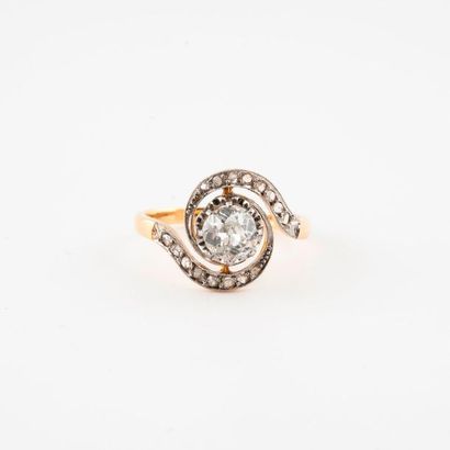 Yellow gold (750) tourbillon ring centered...