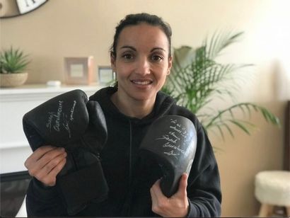 Sarah Ourahmoune 
Boxing gloves signed by...
