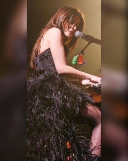 Julie Zenatti donates the dress she wore...