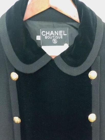 Black CHANEL suit size 42.