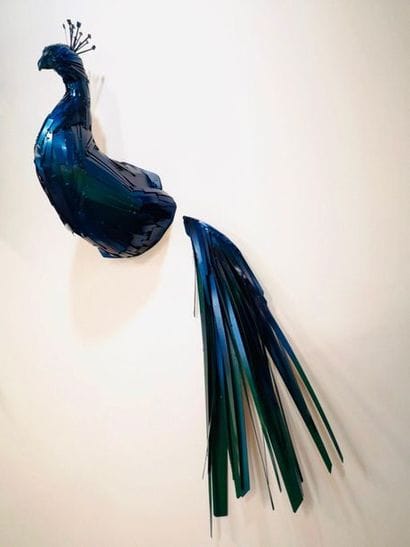 Giani Desmet
Sculpture of a peacock in two...