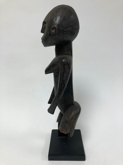 COTE D'IVOIRE, Senoufo

Statuette of a female...