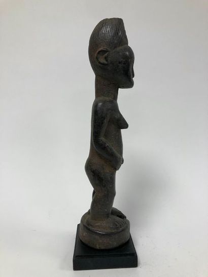 COTE D'IVOIRE, Agni

Standing female statue.

Made...