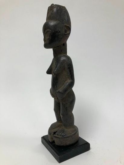 COTE D'IVOIRE, Agni

Standing female statue.

Made...