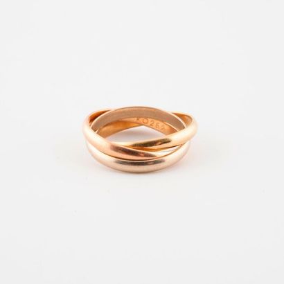 CARTIER, Trinity 


Three-tone gold three-ring...