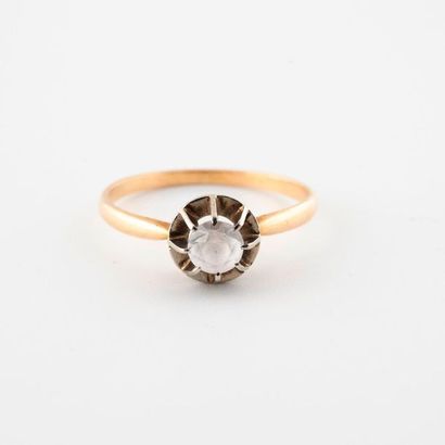 Bague solitaire en ors jaune et gris (750)...