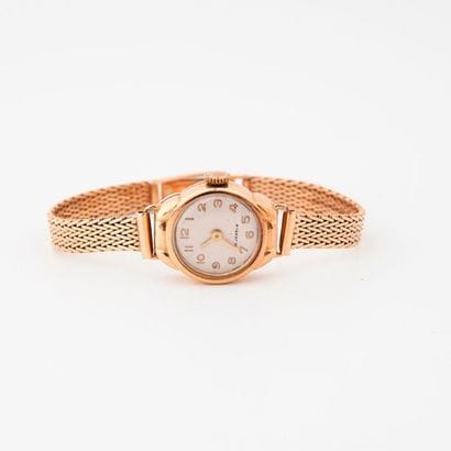 Lady's bracelet watch in yellow gold (750).

Slightly...