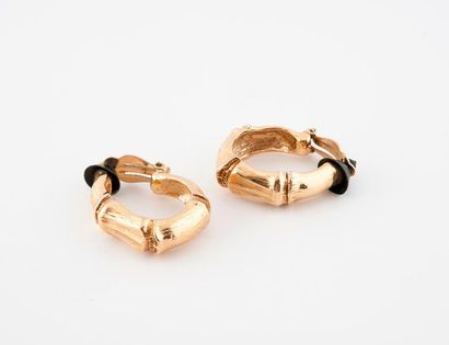 Yves Saint LAURENT


Paire de créoles en...