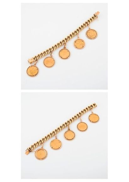 Bracelet gourmette en or jaune (750) retenant...