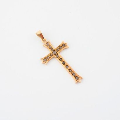 Yellow gold cross (750) adorned with small...
