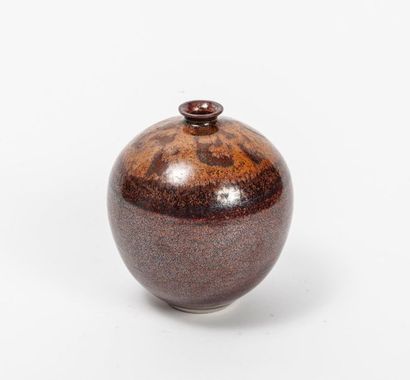 Ball vase with small pinched
neck In orange...