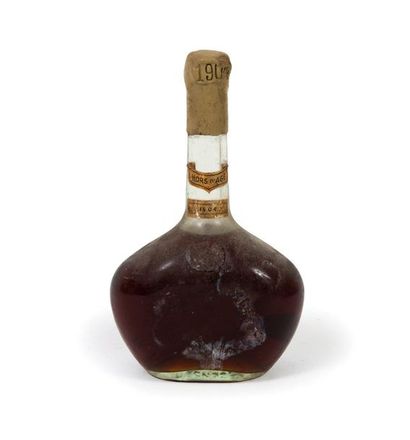 GELAS & FILS Une bouteille, 1904.
Armagnac...