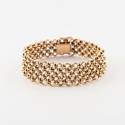 Bracelet en or jaune (750) à maille résille....