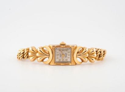Montre bracelet de dame en or jaune (750)...