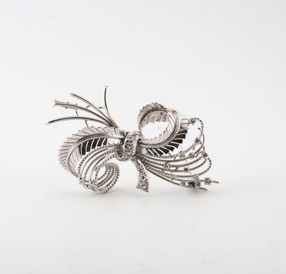 Broche noeud en filins d'or gris (750) torsadés...