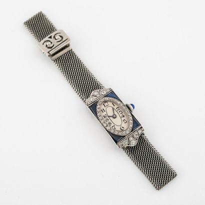 Petite montre de dame. 
Boîtier rectangulaire...