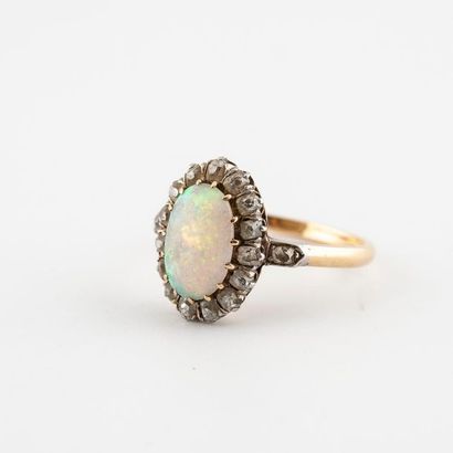 Bague marguerite en ors jaune et gris (750)...