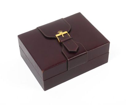 ROLEX
Boîte de montre, gainé de cuir bordeaux...