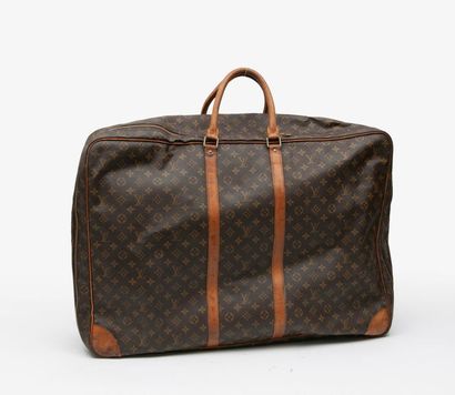 LOUIS VUITTON
Valise souple de voyage en...