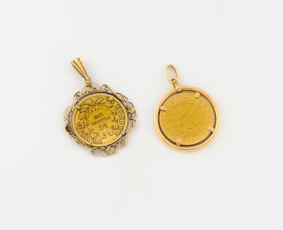 France
Set of two yellow gold pendants (750)...