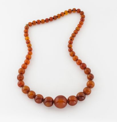 Falling amber ball necklace.

No clasp system.

Length:...