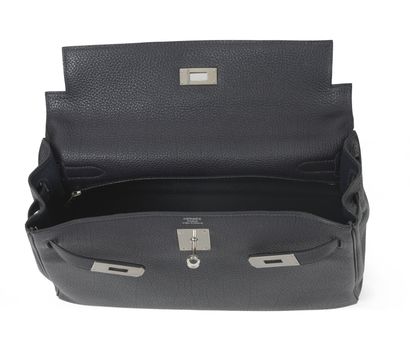 HERMÈS Paris

Sac Kelly 32 cm retourné en...