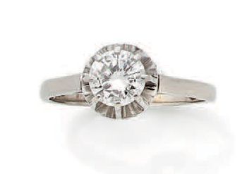 
Bague solitaire en or gris (750) et platine...