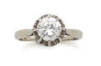Bague solitaire en or gris (750) et platine...