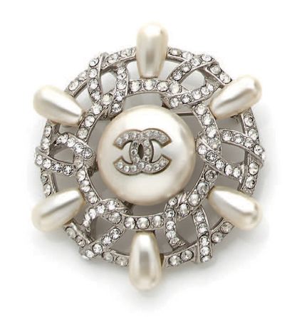 Chanel,
Croisière
Broche en métal argenté...