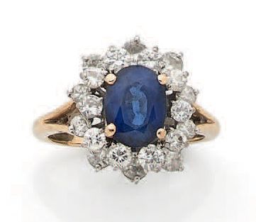 Bague marguerite en ors jaune et gris (750)...