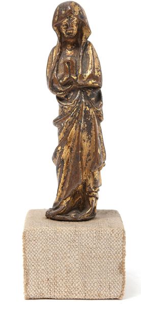Vierge de Calvaire en bronze doré en ronde-bosse.
Debout,...