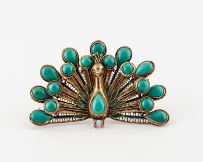 Broche paon en argent doré (min. 800) à décor...