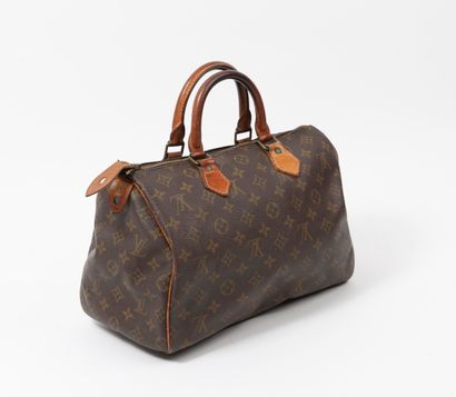 Louis VUITTON, Speedy 
Sac en toile Monogram...