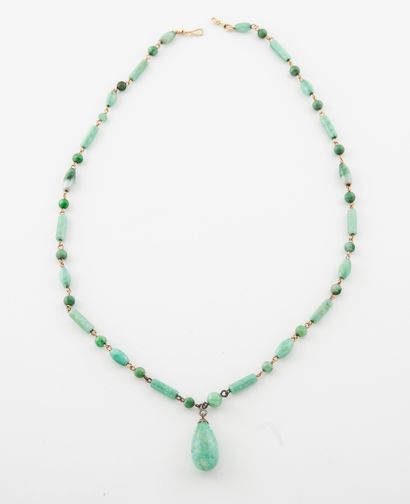 Collier en or jaune (750) et argent (min....