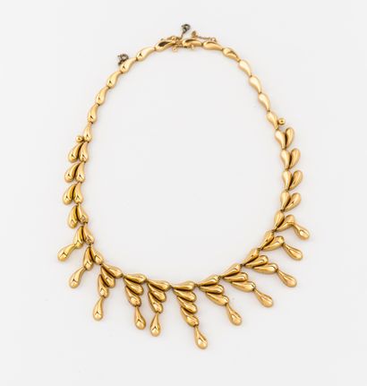 Collier draperie en or jaune (750) à motifs...