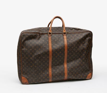 LOUIS VUITTON
Valise souple de voyage en...