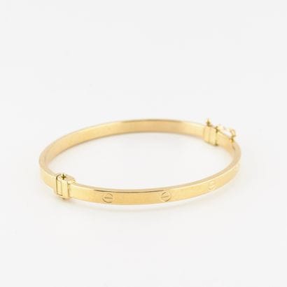 Bracelet jonc ouvrant en or jaune (750) à...