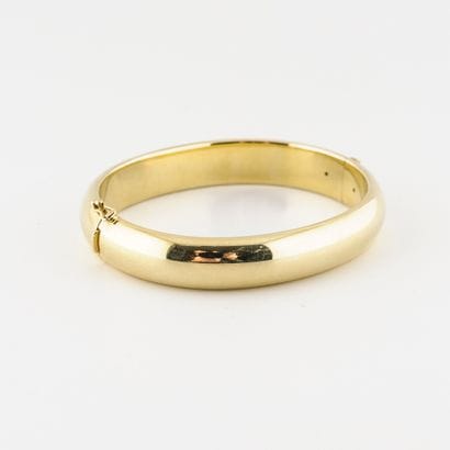 Bracelet jonc ouvrant en or jaune (585) creux....