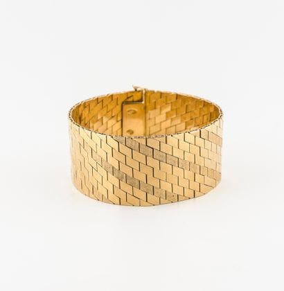Bracelet ruban articulé en or jaune (750)...