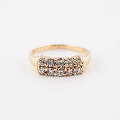 Bague en or jaune (750) ornée de deux lignes...