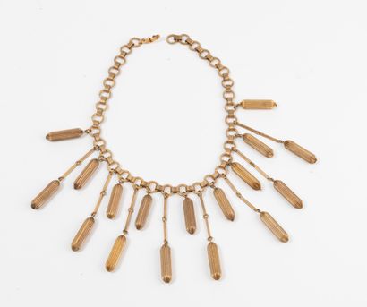 SCHIAPARELLI
Important collier en métal doré...
