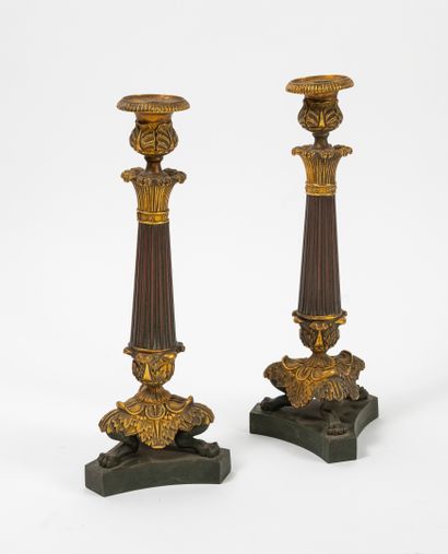 
Quatre paire de flambeaux en bronze ou laiton...