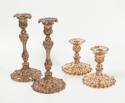 Two pairs of silver-plated hanging torches...
