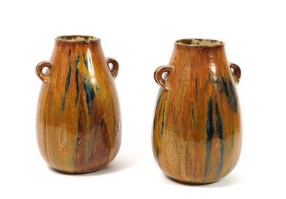 AUGUSTE DELAHERCHE (1857-1940)
Paire de vases,...
