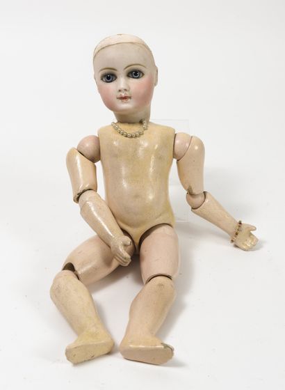 
Poupée, tête en porcelaine marquée en creux,...
