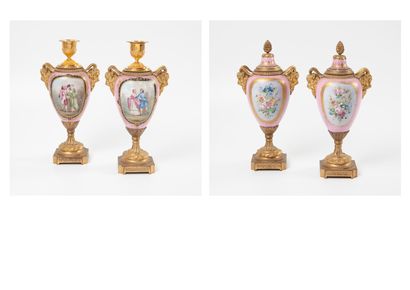 
A pair of porcelain and gilt bronze torch...