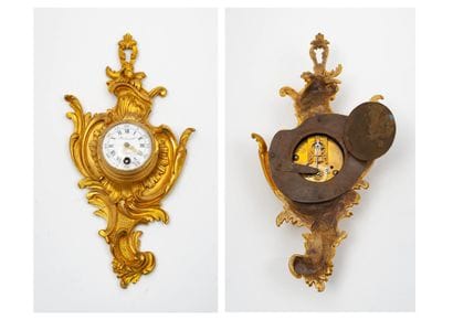 
Small ormolu alcove cartel.




Enamel dial...